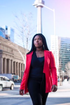 woman wearing red blazer