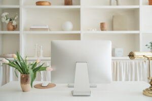 computer monitor in a soft off white decor